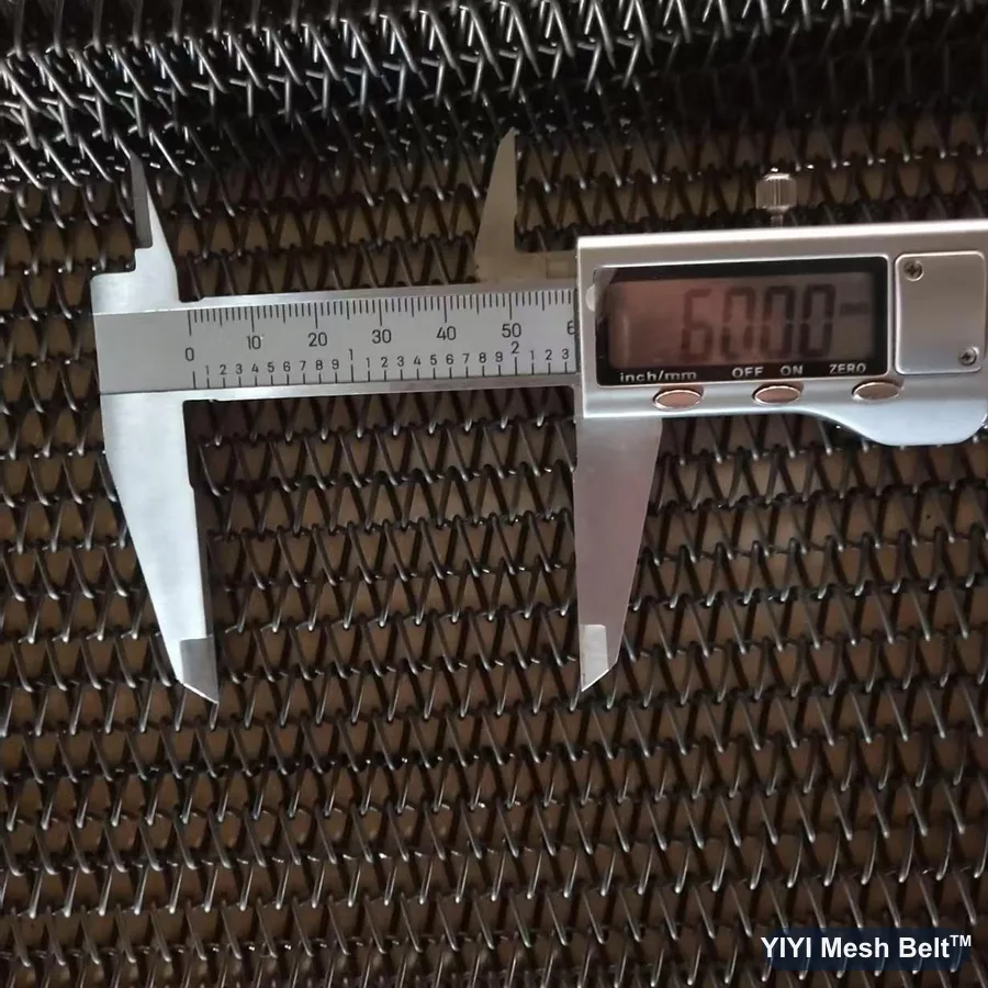 Caliper measuring 10 spiral pitches on a carbon steel balanced weave belt