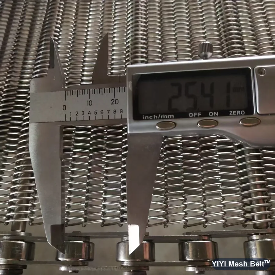 Caliper measuring a 25.4 mm chain pitch on a chain driven belt