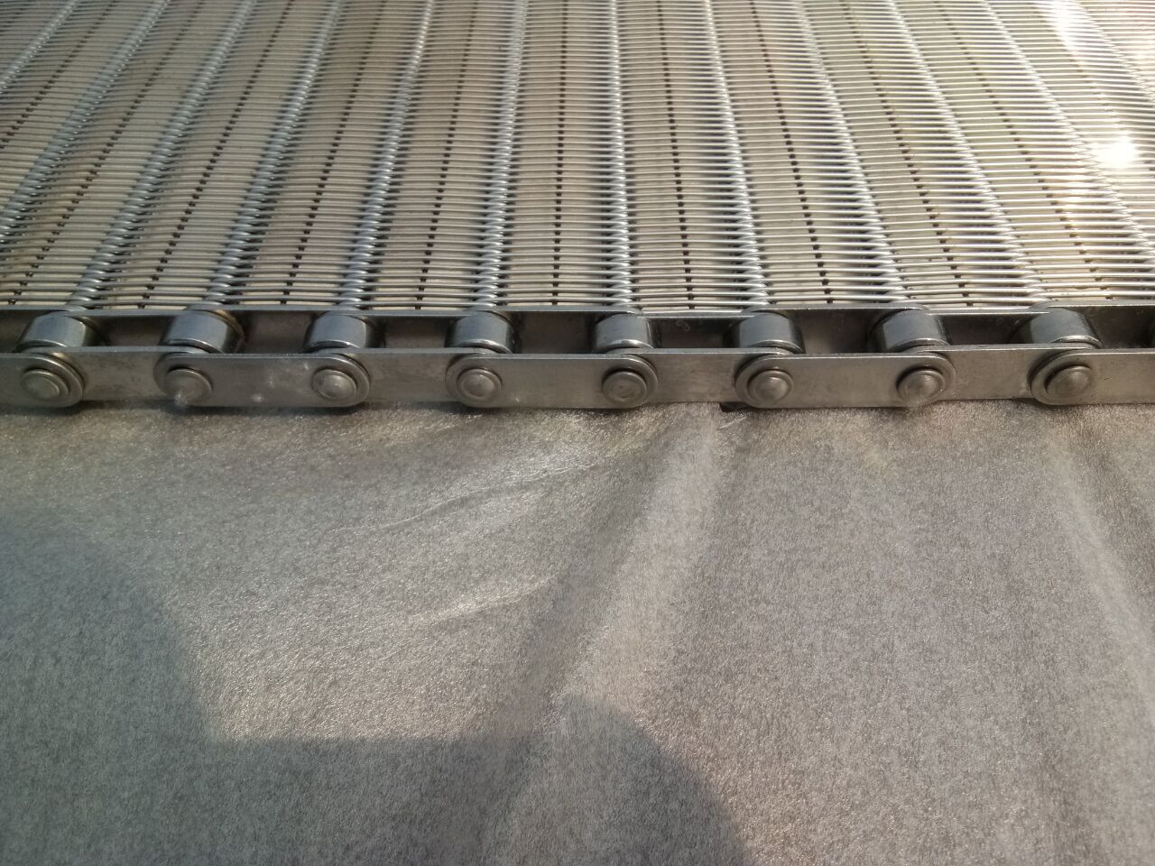 Metal conveyor belt weld detail close-up