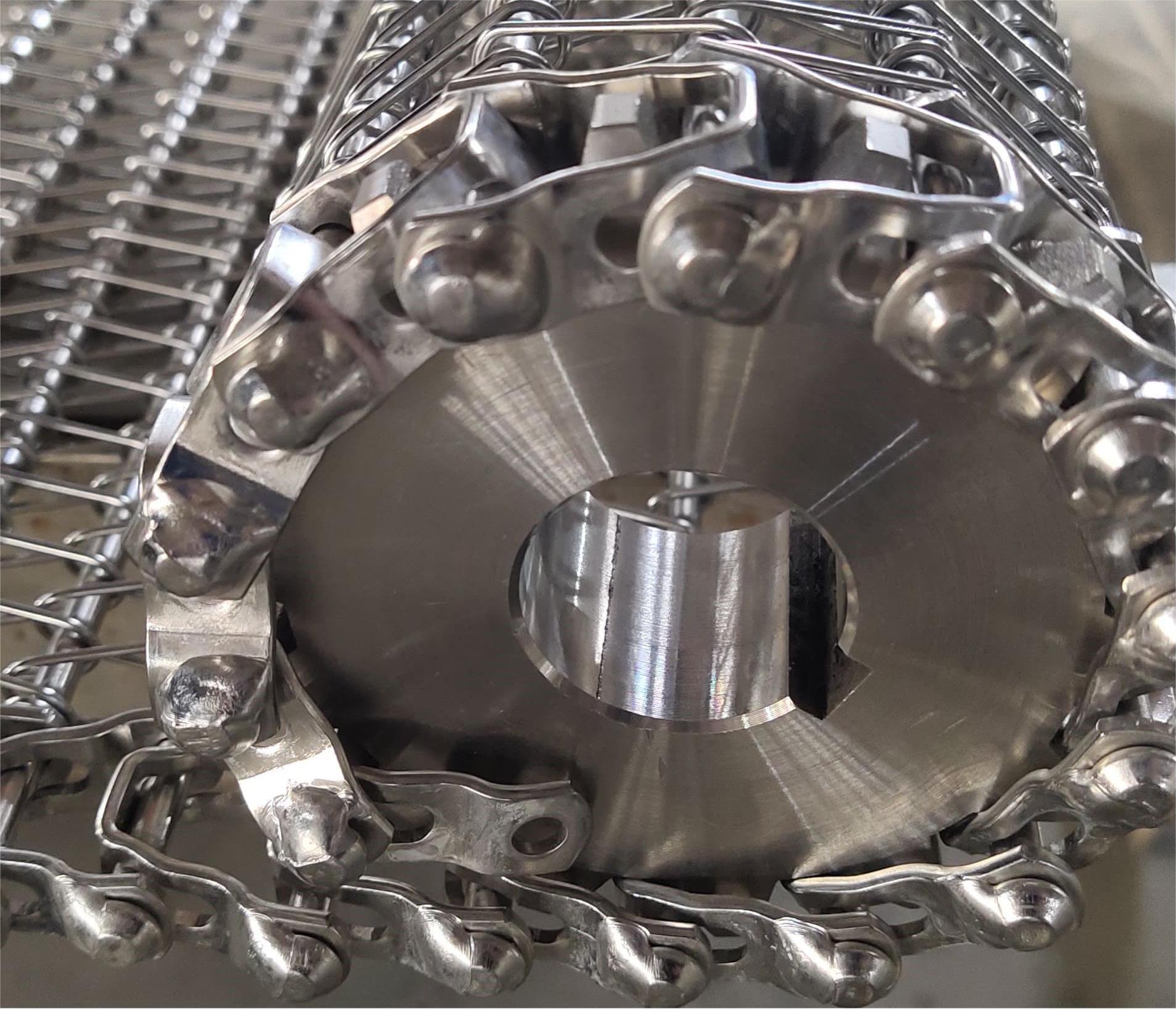 Matched sprocket for self-stacker belt drive system
