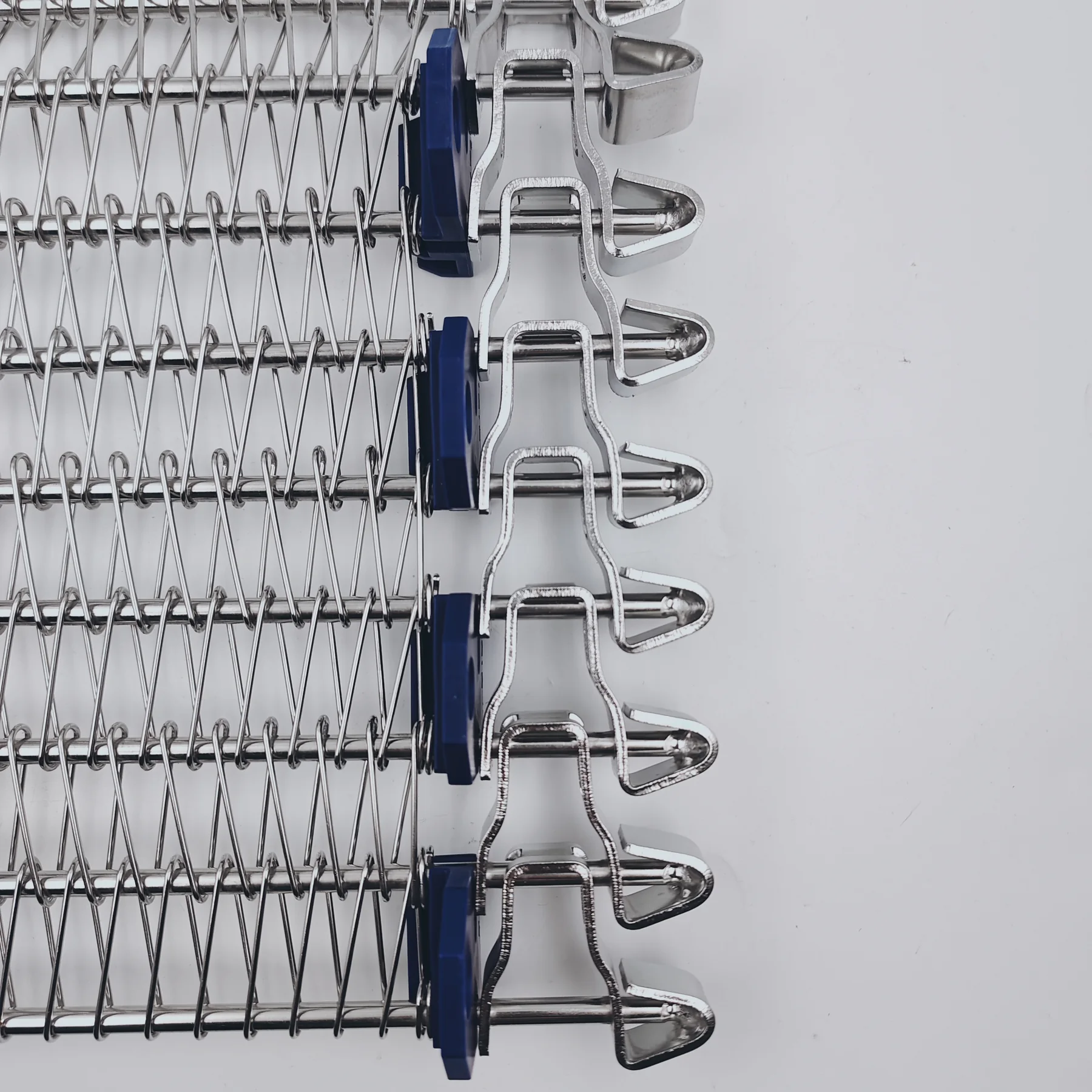 Side driven conveyor belt reinforced edge bar